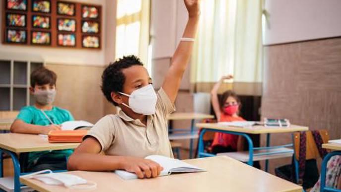 SARS-CoV-2 Transmission Model Offers Decision-Making Pathways for Safe School Opening