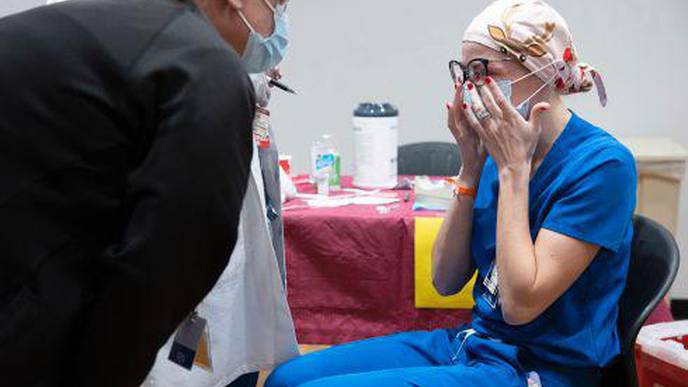 After Months of Trauma, Vaccinated Health-Care Workers Welcome a Surprising Emotion: Hope